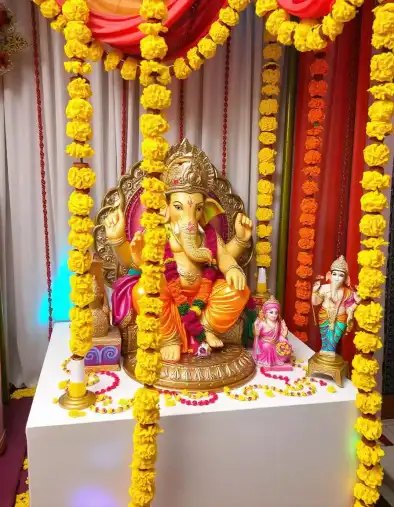 Ganesh Chaturthi home decoration with traditional marigold flowers and Lord Ganesha idol | Traditional Flower Ganesh Chaturthi Decoration | Ganesh Chaturthi | Decorations Guru